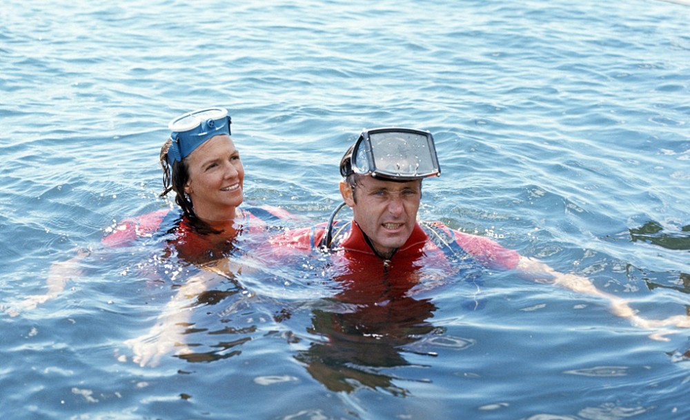 Peter sneers at the camera, while Wendy looks ready for more diving fun.